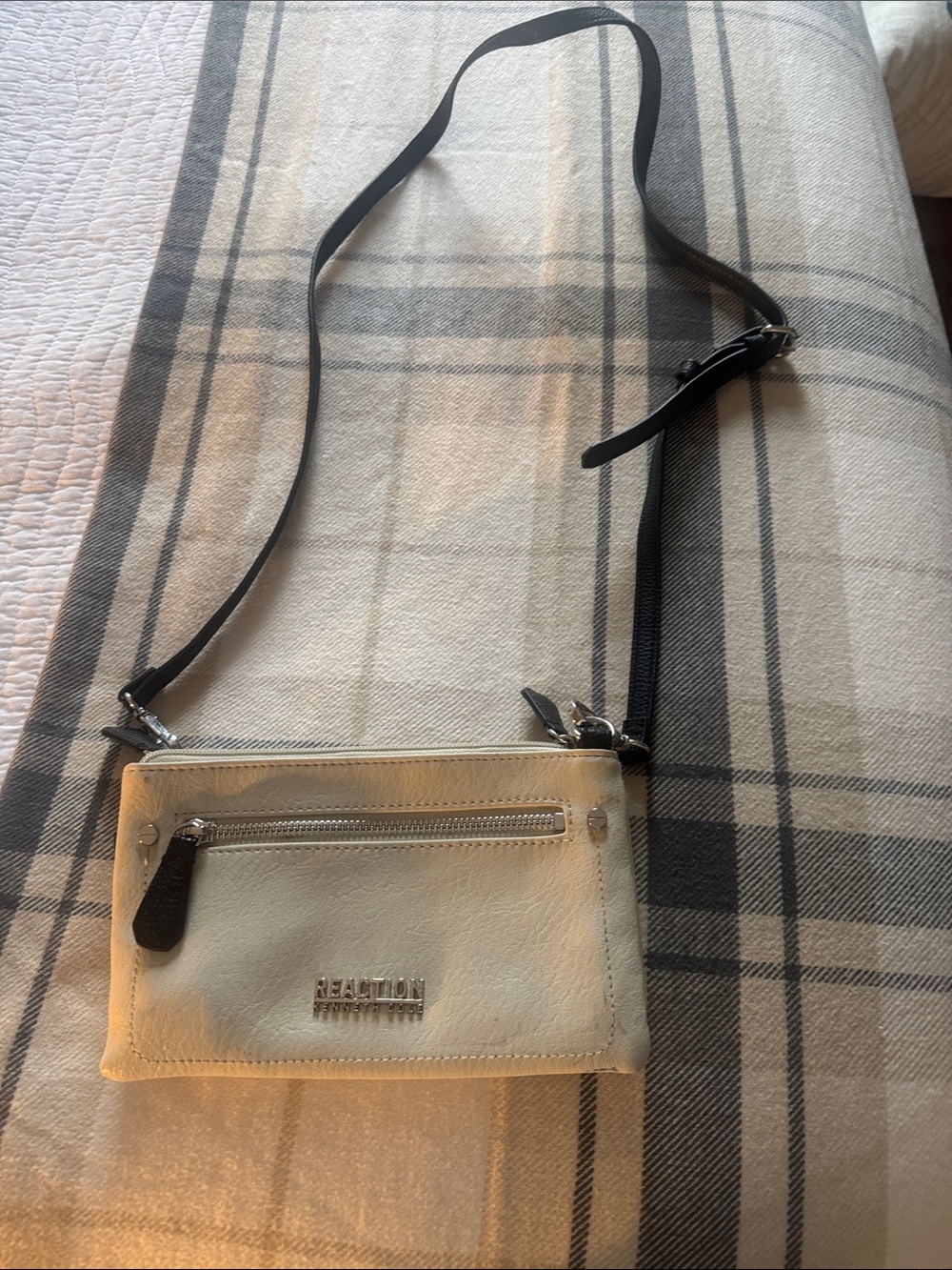 Kenneth Cole Reaction cream crossbody with black strap